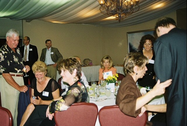 Seated at left of table, Laurel Moss and Stephanie Cairo having a good chat.